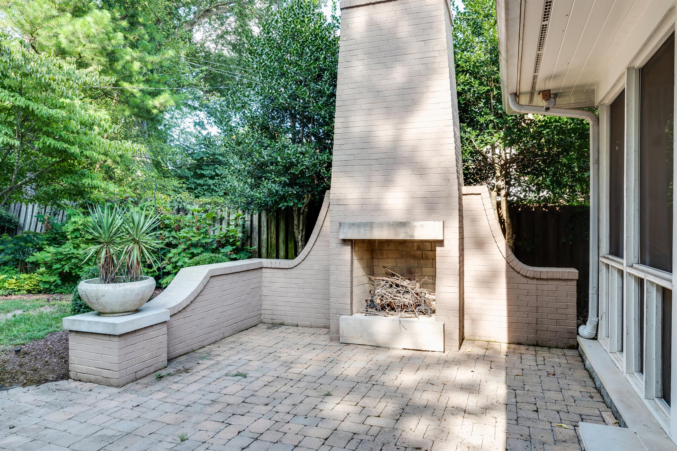 3904 Valley Road Nashville, TN 37205 - Photo 22 of 25 a view of a porch with furniture and garden