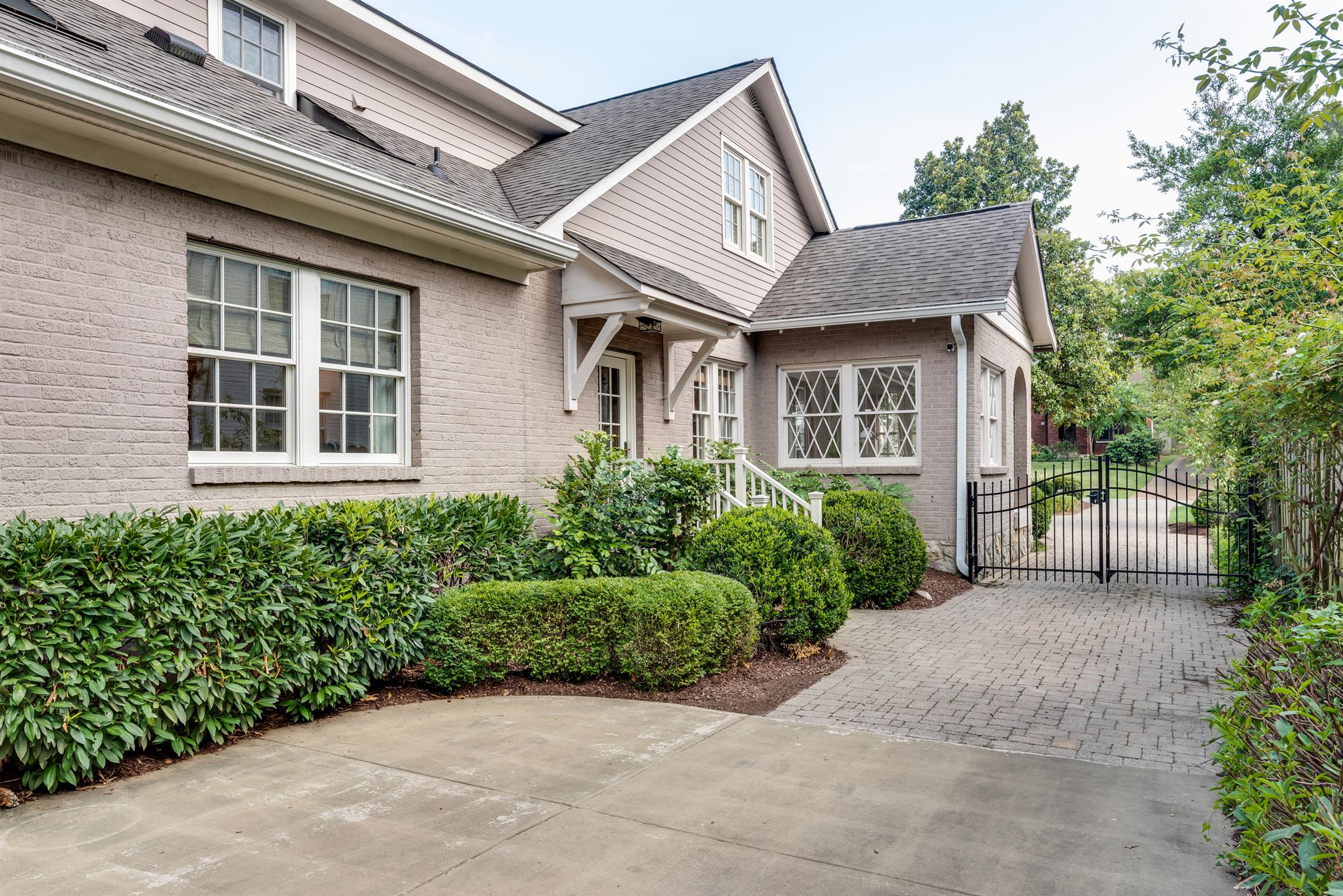 3904 Valley Road Nashville, TN 37205 - Photo 25 of 25 a front view of a house with garden