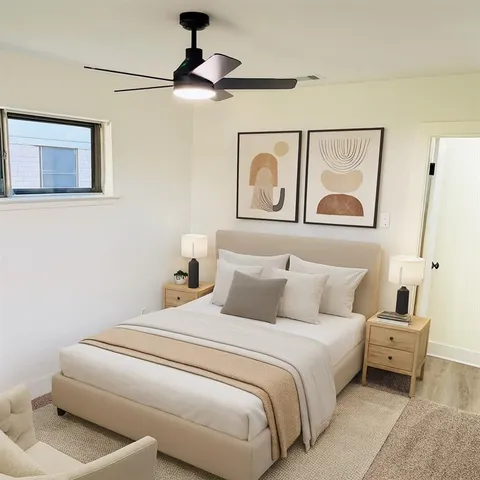 a view of a room with wooden floor and cabinet