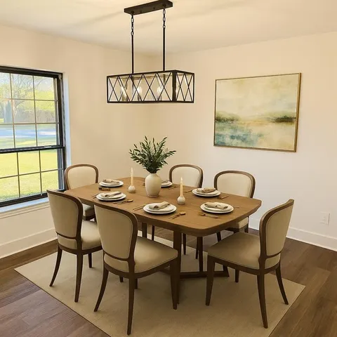 a kitchen with a sink and a wooden floor