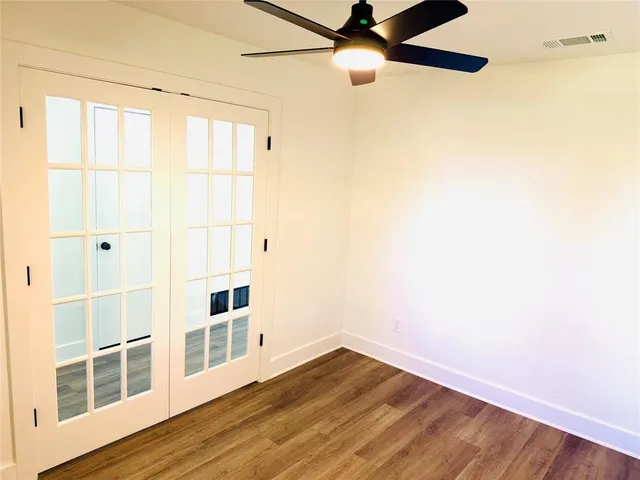 a kitchen with stainless steel appliances a refrigerator and a sink