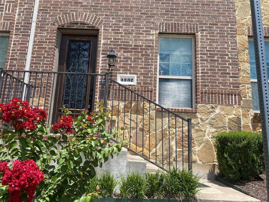 4232 Charles Road Carrollton, TX 75010 - Photo 1 of 21 a front view of a house with an outdoor space