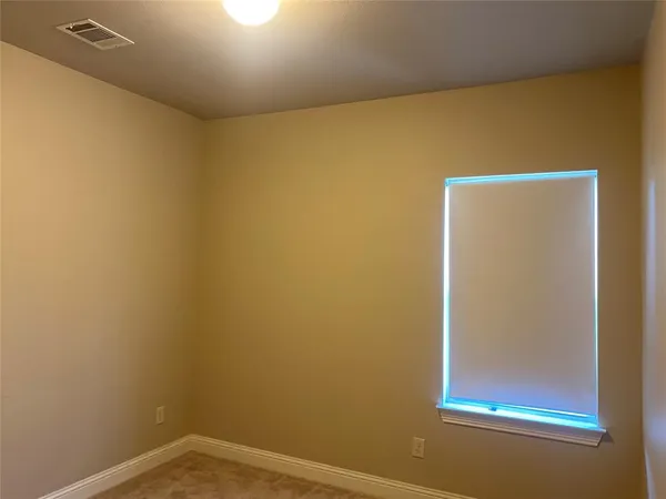 a view of a small space with a window