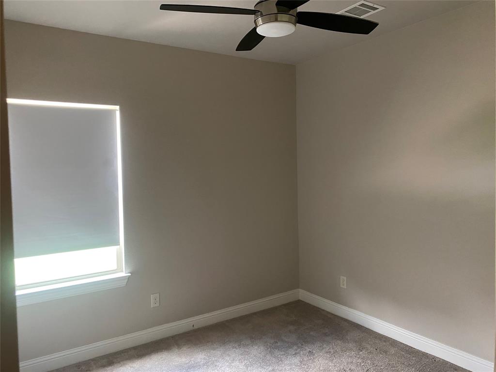 4232 Charles Road Carrollton, TX 75010 - Photo 12 of 21 a view of a small space with a window
