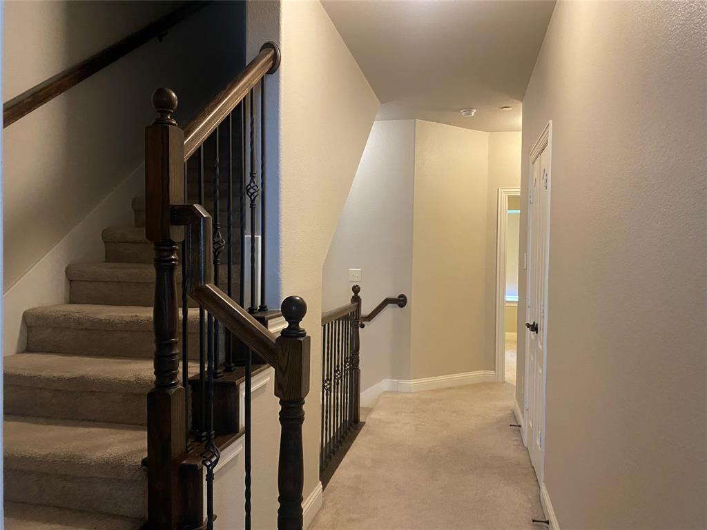 4232 Charles Road Carrollton, TX 75010 - Photo 17 of 21 a view of hallway with stairs