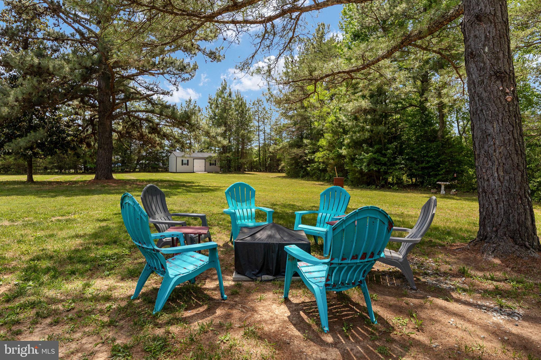 22088 Landora Bridge Road Ruther Glen, VA 22546 - Photo 12 of 122 Charming outdoor gathering space.