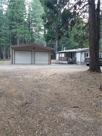 front view of a house with a trees