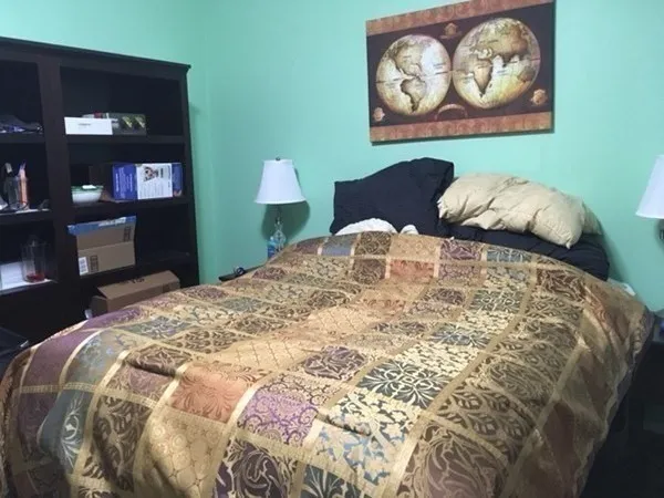 a view of a dining room with furniture and window