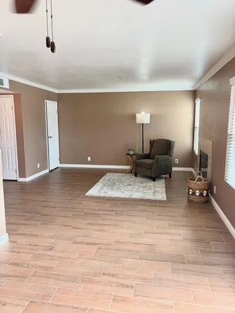 a view of a workspace with furniture