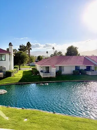 a view of swimming pool and lake