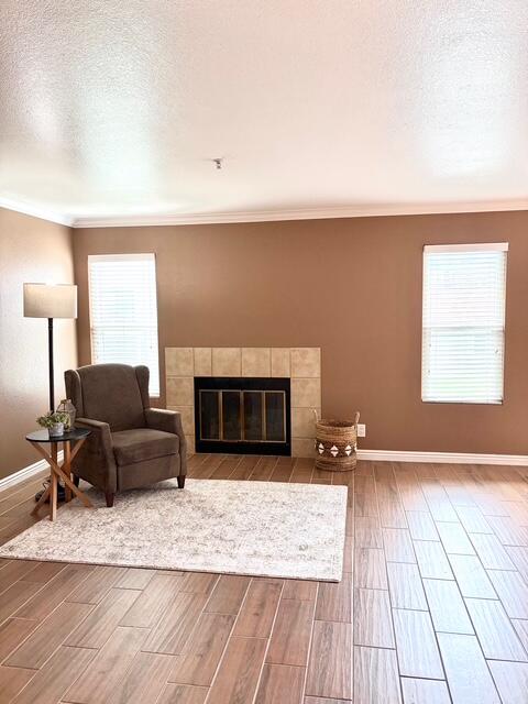 43376 Cook Street, Unit 88 Palm Desert, CA 92211 - Photo 9 of 38 a living room with furniture and a fireplace