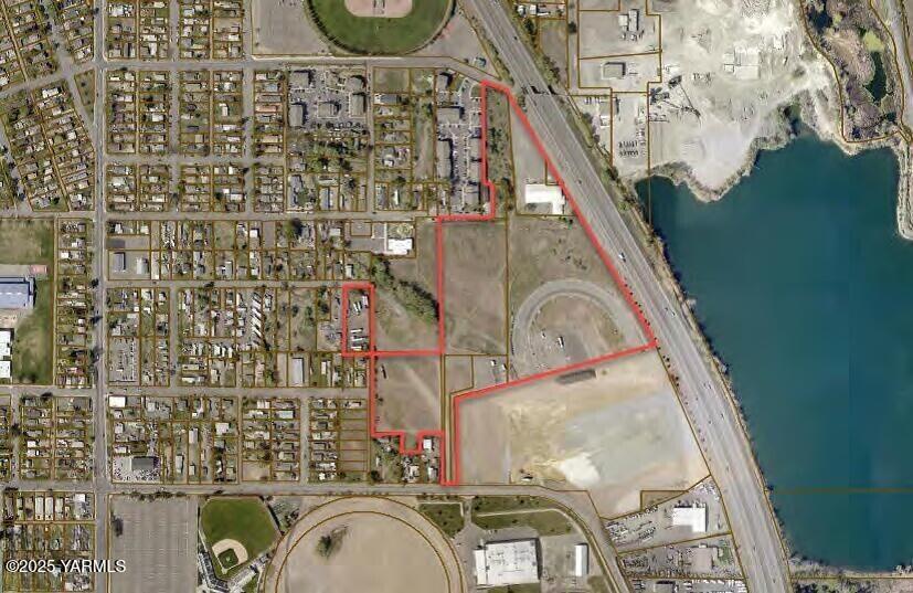 a view of a balcony with brick wall and potted plants