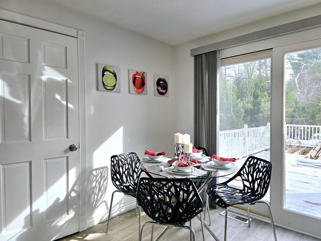 104 West Meadow Road Townsend, MA 01474 - Photo 8 of 42 a view of a dining room with furniture window and outside view