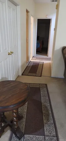 a kitchen with a stove and a refrigerator