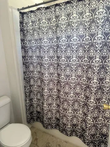 a bedroom with a bed