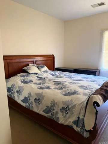 a room with furniture and a window