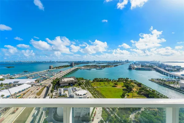 a view of a lake from a balcony