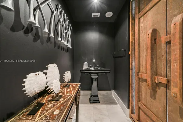 a kitchen with stainless steel appliances granite countertop a stove and a refrigerator