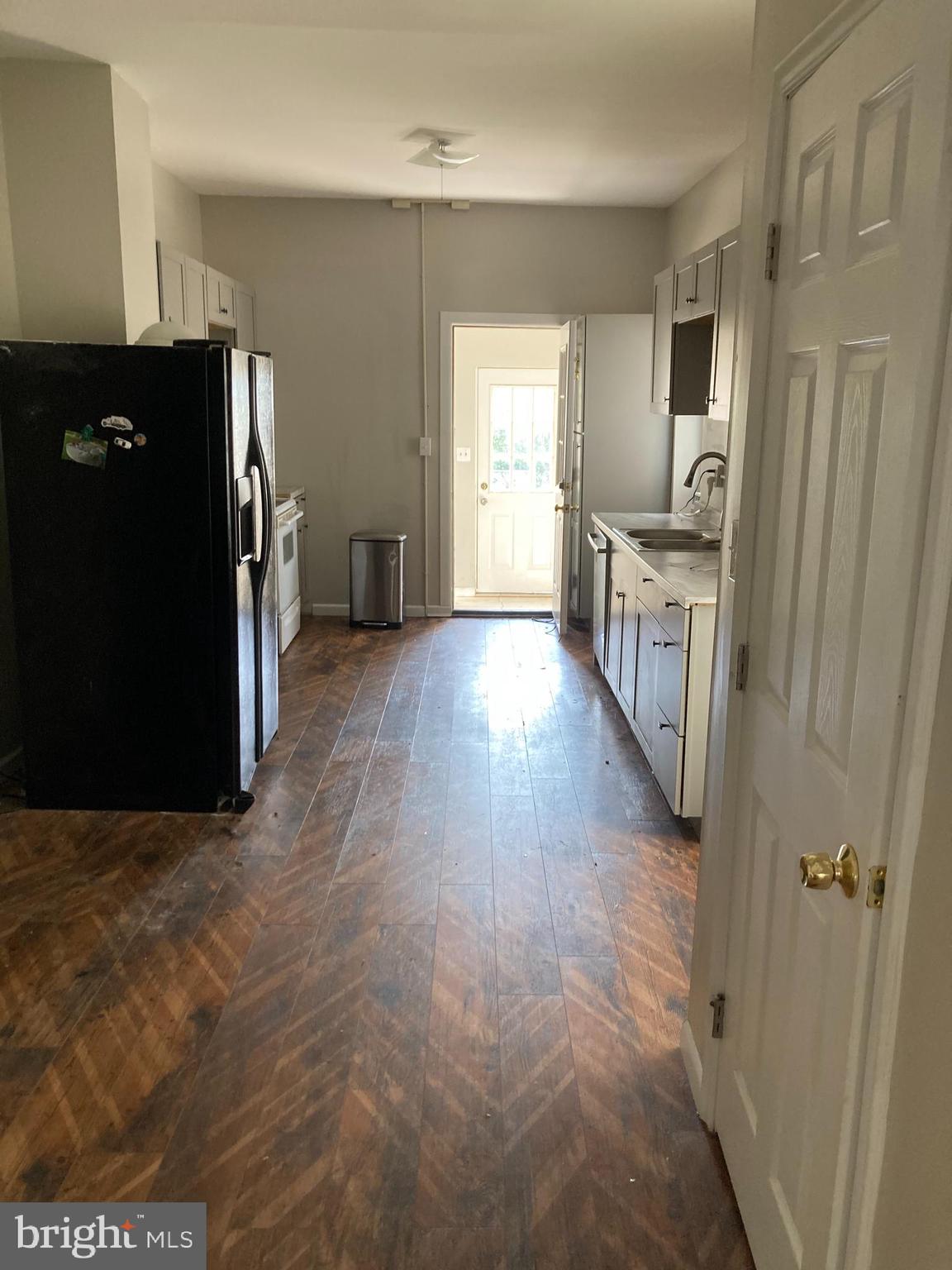 917 High Street Bethlehem, PA 18018 - Photo 3 of 3 a view of a refrigerator in kitchen and wooden floor