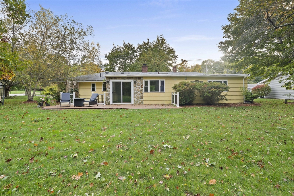 26 Wentworth Road Canton, MA 02021 - Photo 25 of 28 a front view of house with yard and green space