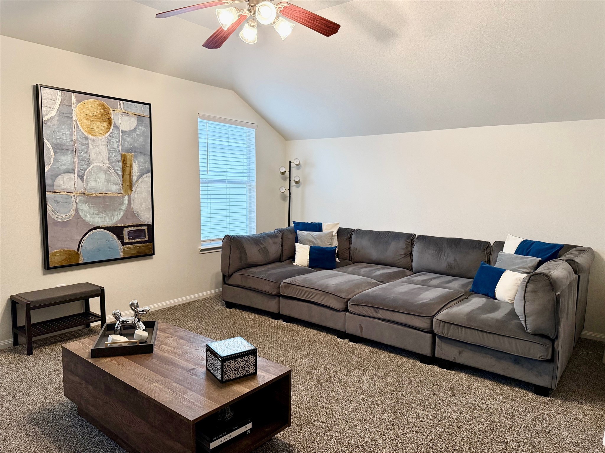 142 East Spindle Tree Circle The Woodlands, TX 77382 - Photo 15 of 37 a living room with furniture and a night stand
