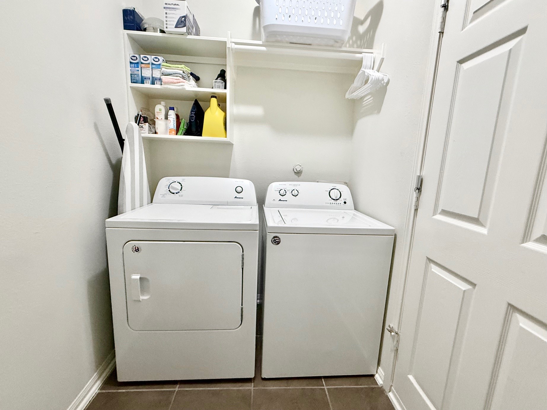 142 East Spindle Tree Circle The Woodlands, TX 77382 - Photo 23 of 37 a utility room with dryer and washer