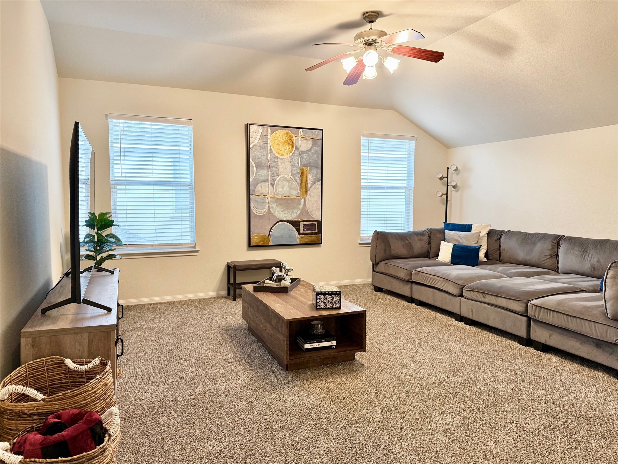142 East Spindle Tree Circle The Woodlands, TX 77382 - Photo 31 of 37 a living room with furniture and a potted plant