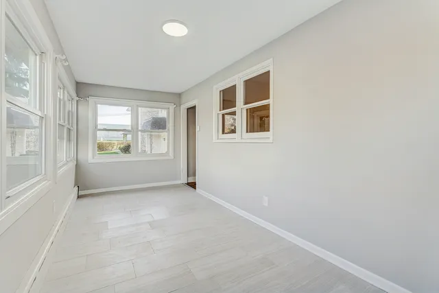 an empty room with windows