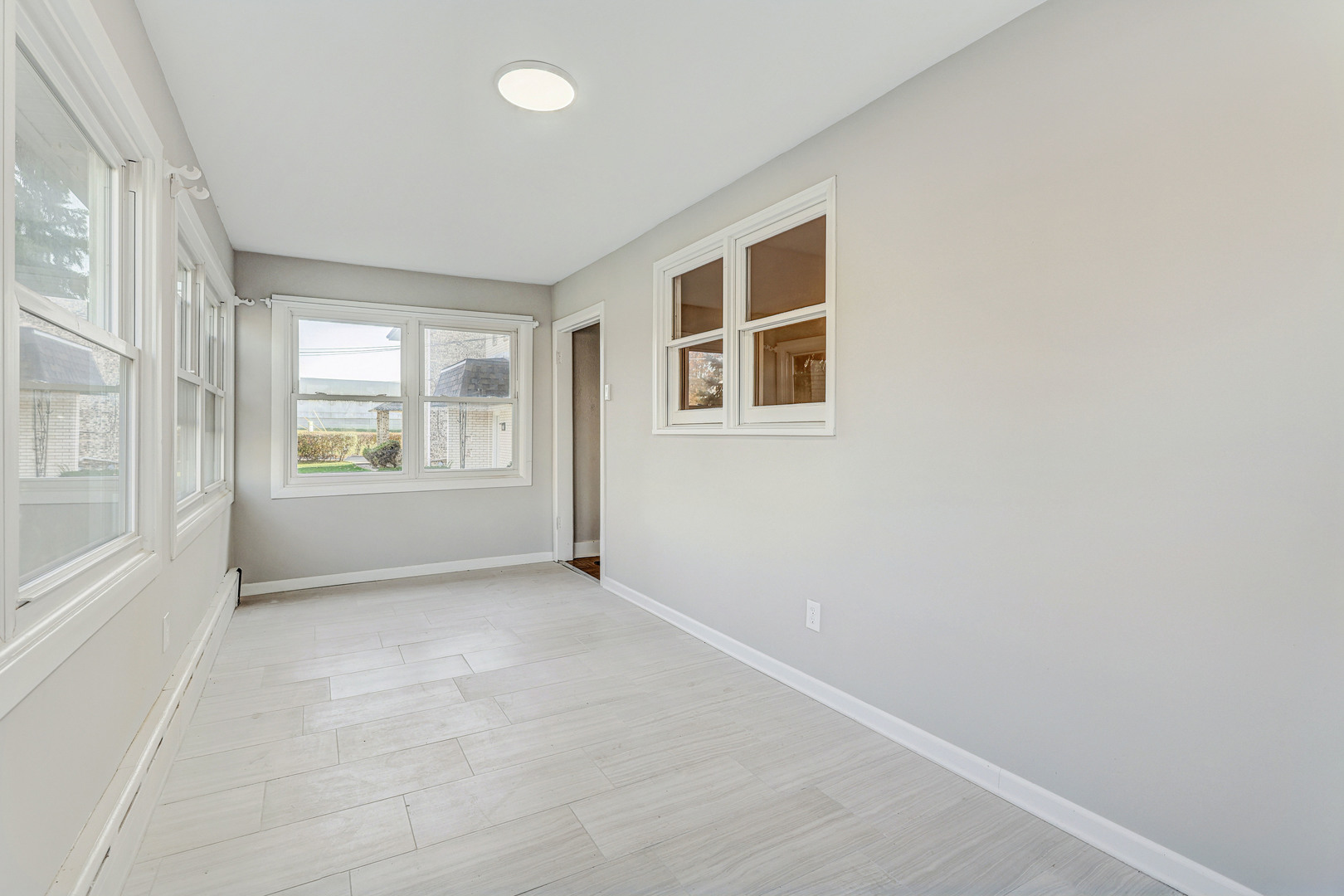 7832 Garden Lane Justice, IL 60458 - Photo 3 of 67 an empty room with windows