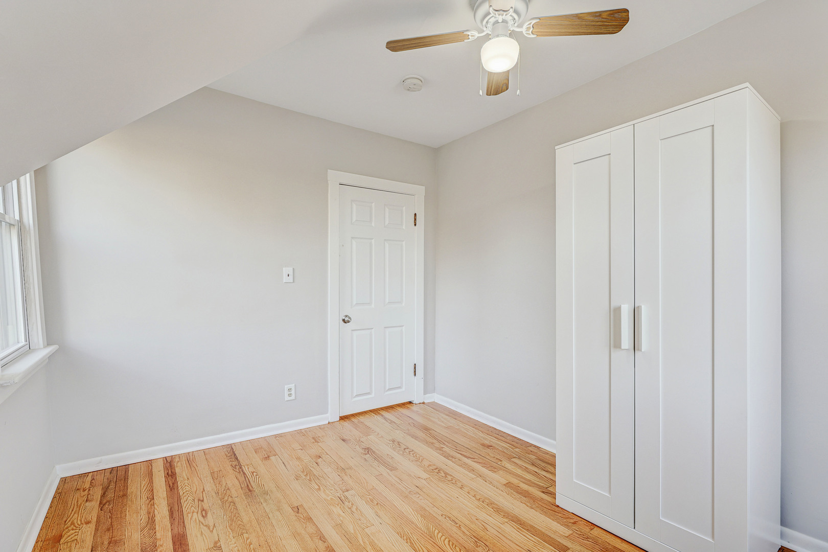 7832 Garden Lane Justice, IL 60458 - Photo 46 of 67 a view of an empty room with wooden floor