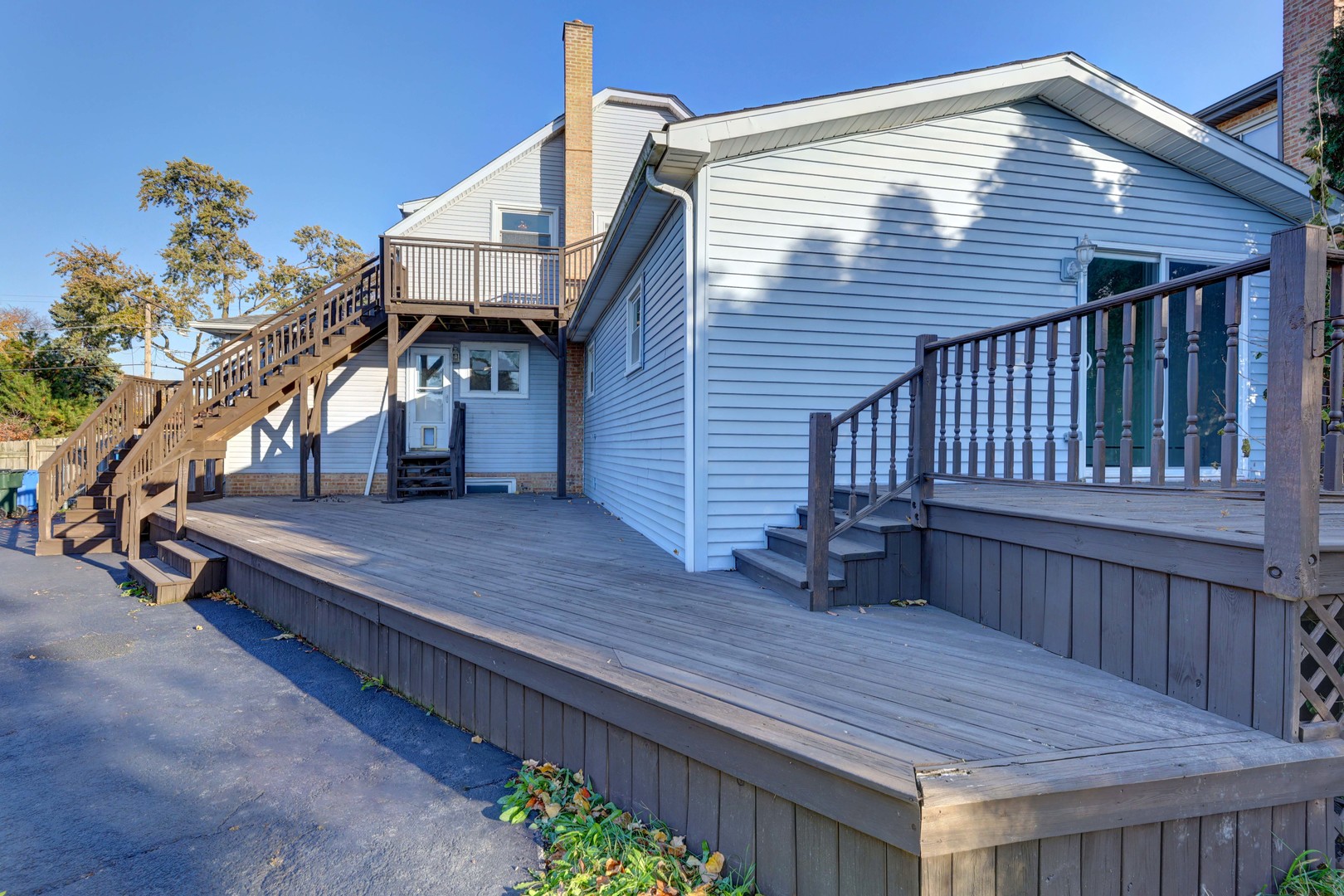 7832 Garden Lane Justice, IL 60458 - Photo 60 of 67 a view of backyard with deck and wooden floor