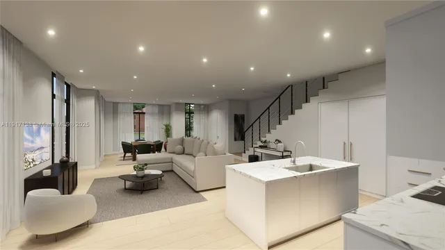 a kitchen with a sink cabinets and wooden floor