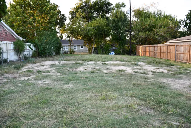 a house view with a backyard space