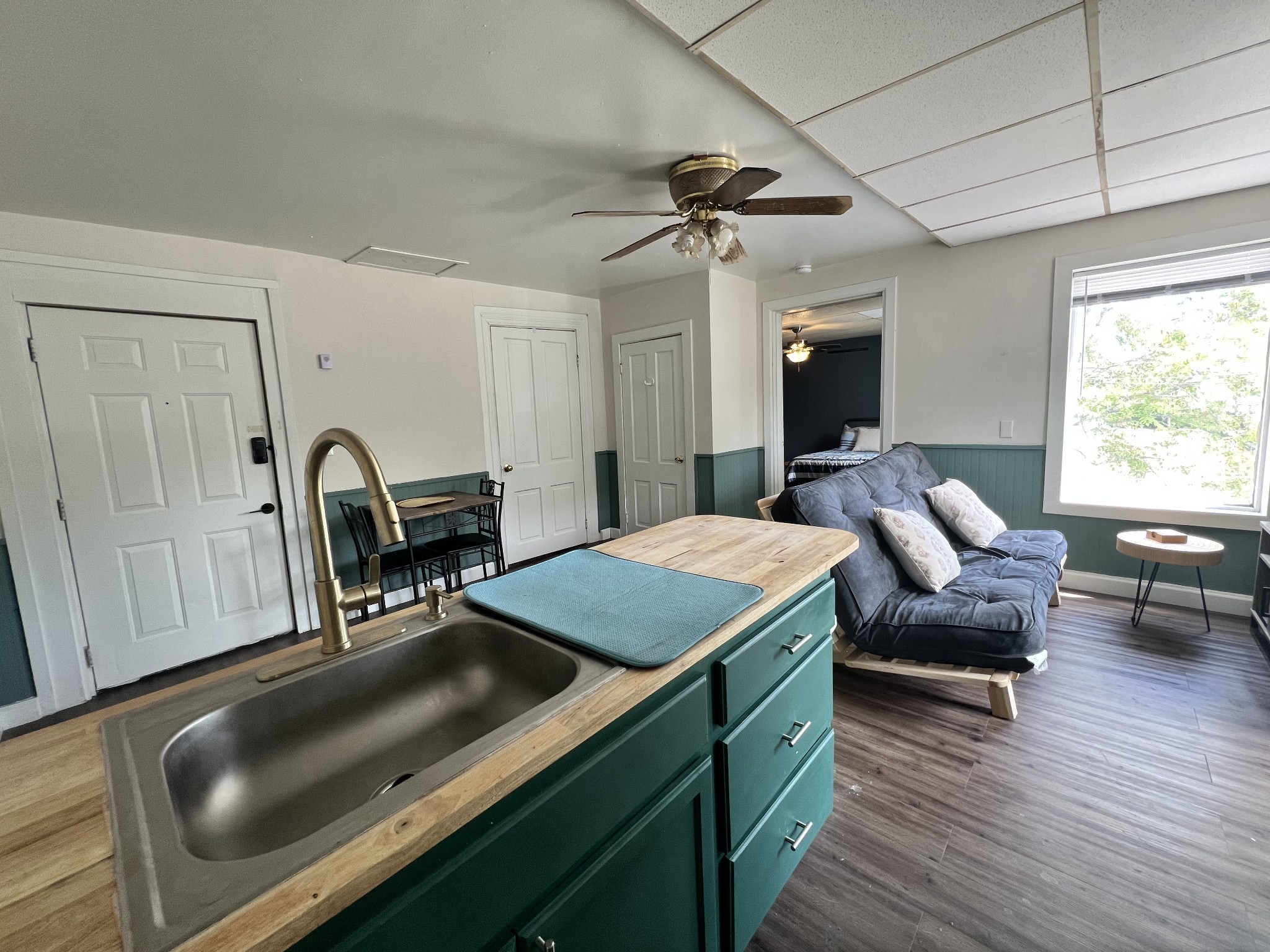 917 South High Street Columbia, TN 38401 - Photo 14 of 42 a view of a kitchen area with furniture and wooden floor