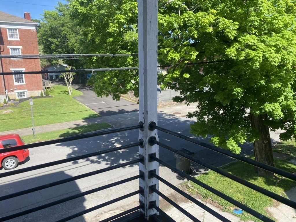 917 South High Street Columbia, TN 38401 - Photo 24 of 42 a view of a wooden bench sitting in front of a yard