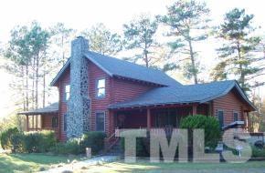 928 Dalrymple Road Cameron, NC 28326 - Photo 1 of 22 a front view of a house with garden