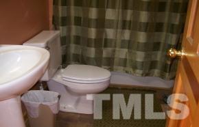 928 Dalrymple Road Cameron, NC 28326 - Photo 13 of 22 a bathroom with a toilet and a sink