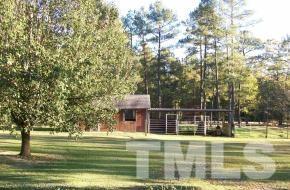 928 Dalrymple Road Cameron, NC 28326 - Photo 19 of 22 a view of a swimming pool with a patio