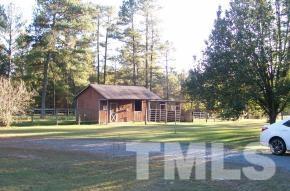 928 Dalrymple Road Cameron, NC 28326 - Photo 20 of 22 a view of a house with a yard