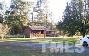 928 Dalrymple Road Cameron, NC 28326 - Photo 21 of 22 a house view with a garden space