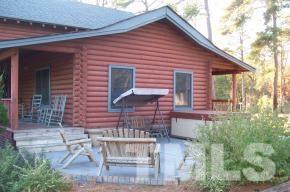 928 Dalrymple Road Cameron, NC 28326 - Photo 4 of 22 a front view of a house with garden