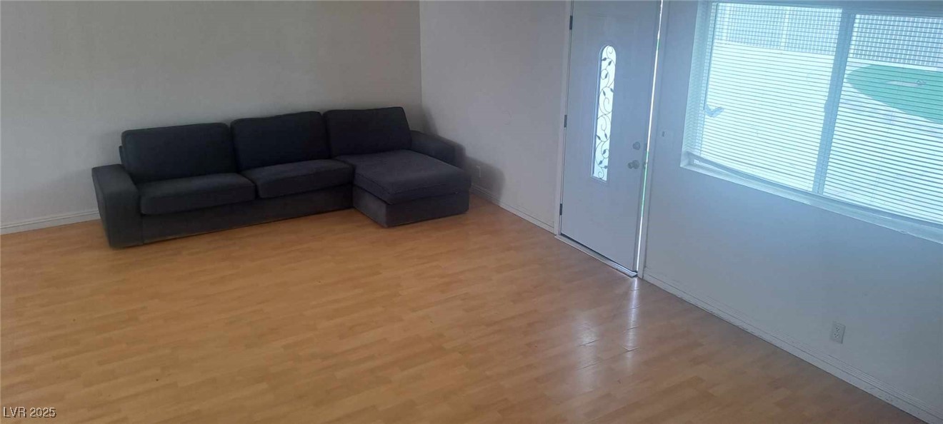 Living area featuring light wood-type flooring