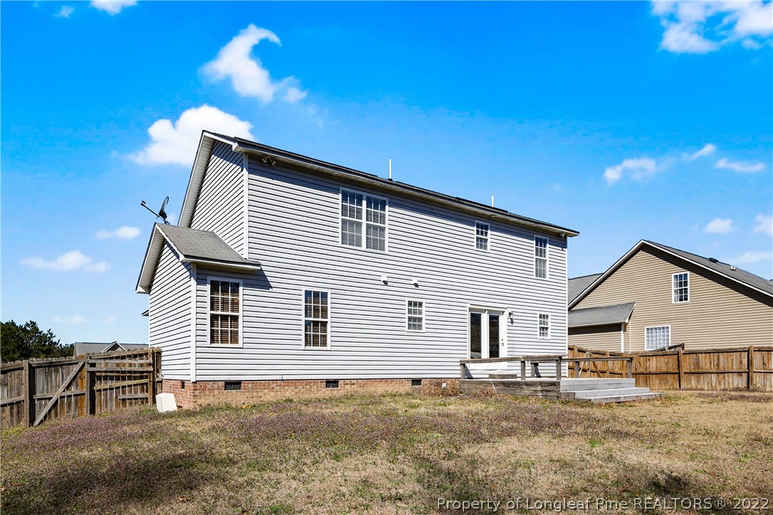 57 Pender Road Spring Lake, NC 28390 - Photo 47 of 50 a view of a house with a patio