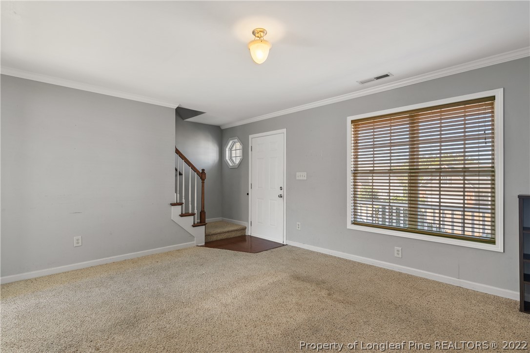 57 Pender Road Spring Lake, NC 28390 - Photo 7 of 50 a view of an empty room with a window