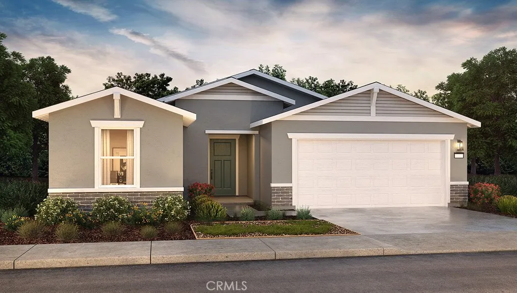 613 Marshall Lane, Unit 126 B2 Merced, CA 95340 - Photo 1 of 19 a front view of a house with a yard and garage