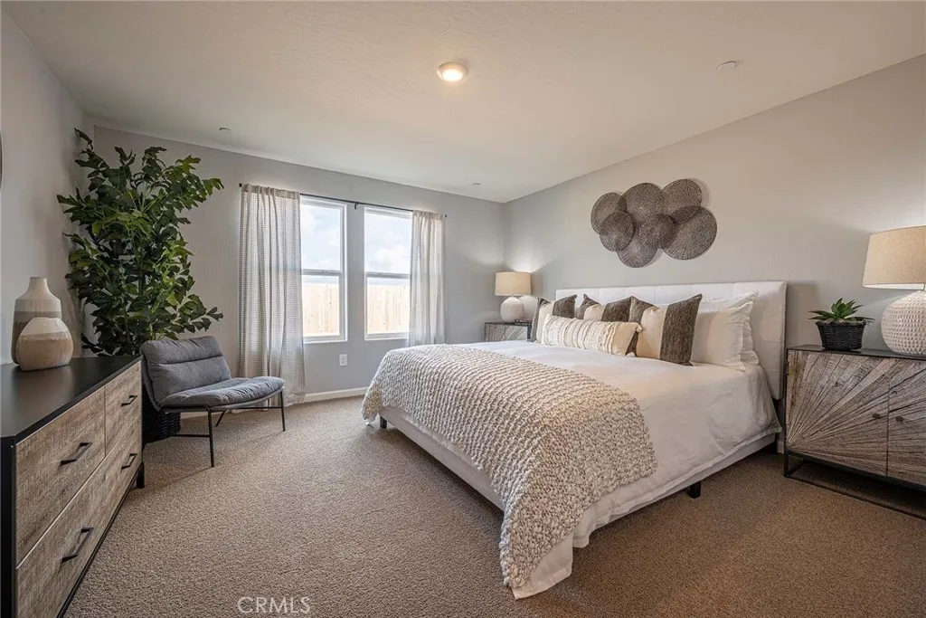 613 Marshall Lane, Unit 126 B2 Merced, CA 95340 - Photo 12 of 19 a bedroom with bed and a window