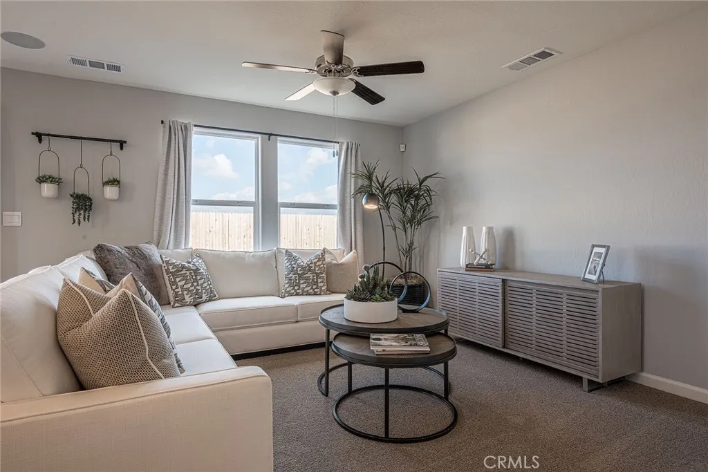 613 Marshall Lane, Unit 126 B2 Merced, CA 95340 - Photo 10 of 19 a living room with furniture and a window