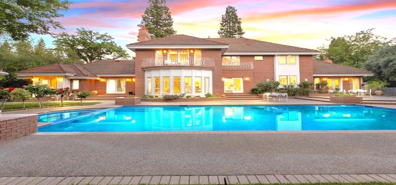 557 Crocker Road Sacramento, CA 95864 - Photo 21 of 21 Truly serene backyard featuring a huge pool along with a dedicated seating area perfect for family dinings or gatherings.