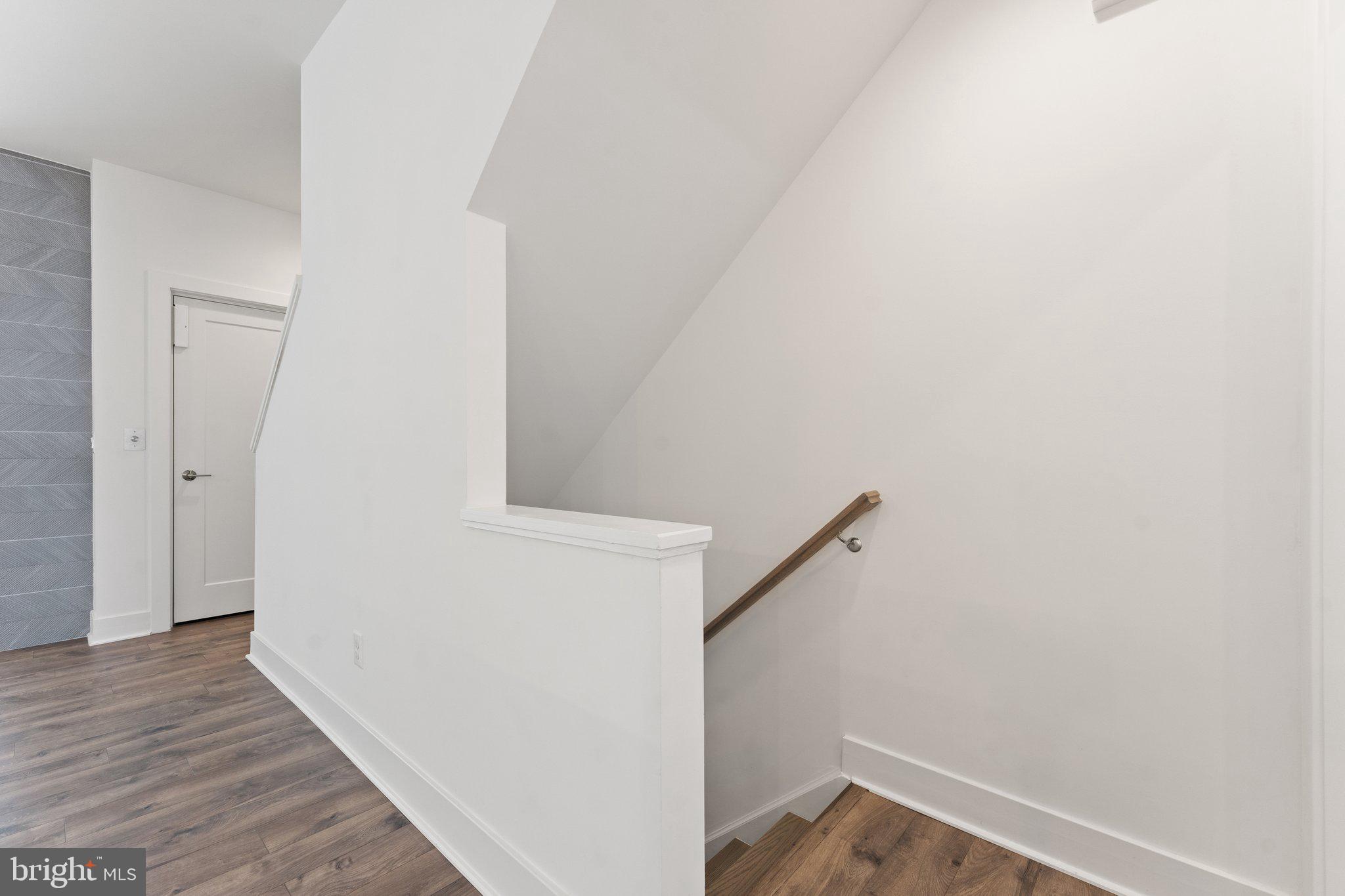 1876 Michael Faraday Drive Reston, VA 20190 - Photo 12 of 58 Stairs to main level