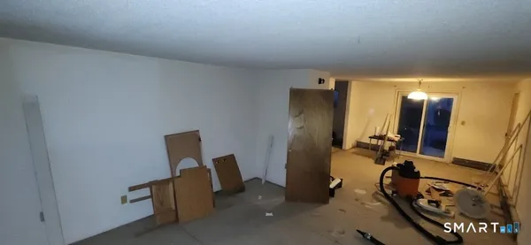 a room with cabinets and wooden floor